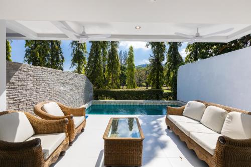 4 bedrooms &amp; bathroom for up to 12 guests 7kms to Patong beach at The Fairways golf villas