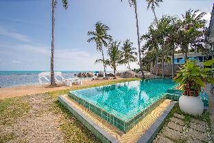 Beachfront loft style villa with private pool