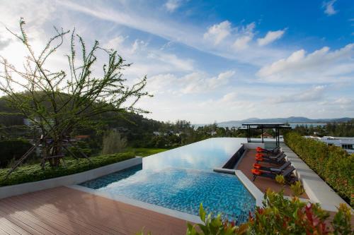 Comfy 1 Bedroom Condo in Surin (Seaview Rooftop Pool &amp; Gym)
