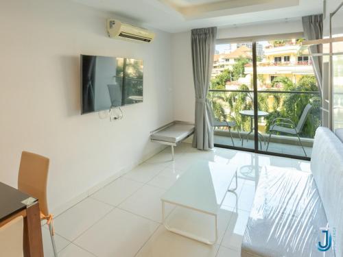 Cozy studio with 2 pools and sea view