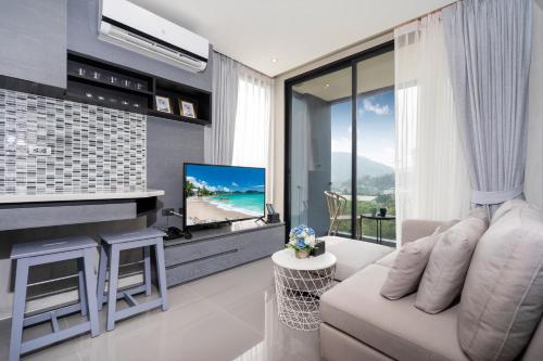Enjoy Tropics Hill Views in Kamala Suite CTG L705, Top Facilities, near FantaSea &amp; Cafe Del Mar Beac