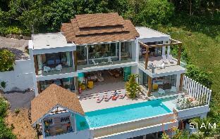 Four Bedroom 5* Luxury villa-stroll to beach