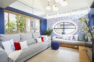 Ginger JaR - Ari, Blue and white stylish house.