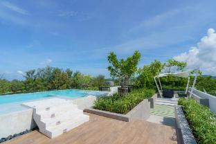 Laguna 1BDR 10 min to the Sea Roof Pool