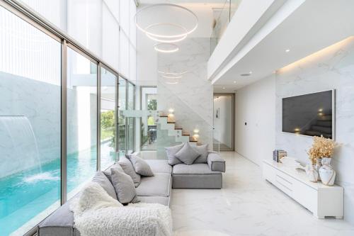 New Modern Aesthetic 3-Storey Villa A15 in Gated Residence just 10 min drive Laguna Phuket