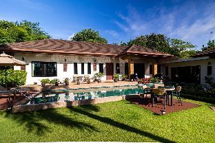 Spacious pool villa with garden and staff