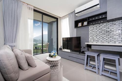 Sun, Fun &amp; Chill - Tropics Kamala Apartment CTG P708 with Green Views, near Beach