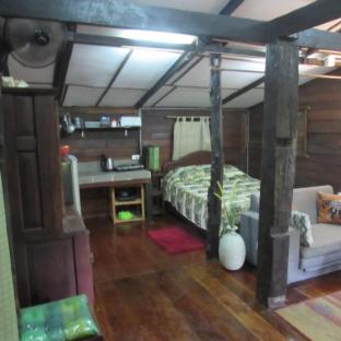 teak house in a thai village in a thai village